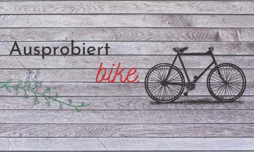 © Fotograf / Canva / Hintergrund: Marketplace Designers / Bild: Marketplace Designers / Flower: Canva Ausprobiert BIKE: Clevere Biketasche, große Brille, Abstandswarner